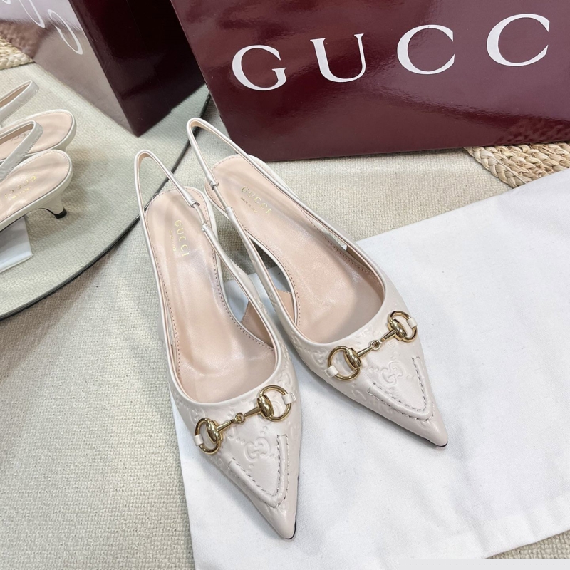 G*u*i sandals